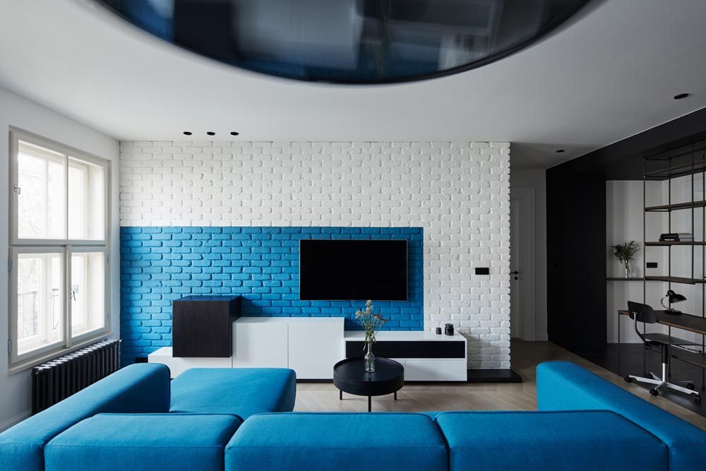 apartment design blue brick wall 1000x667 - Ovenecka Apartment