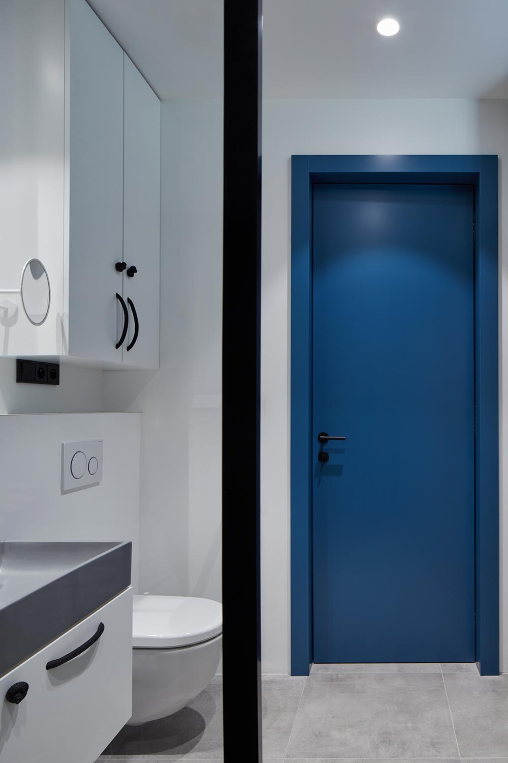 apartment design blue door bathroom - Ovenecka Apartment