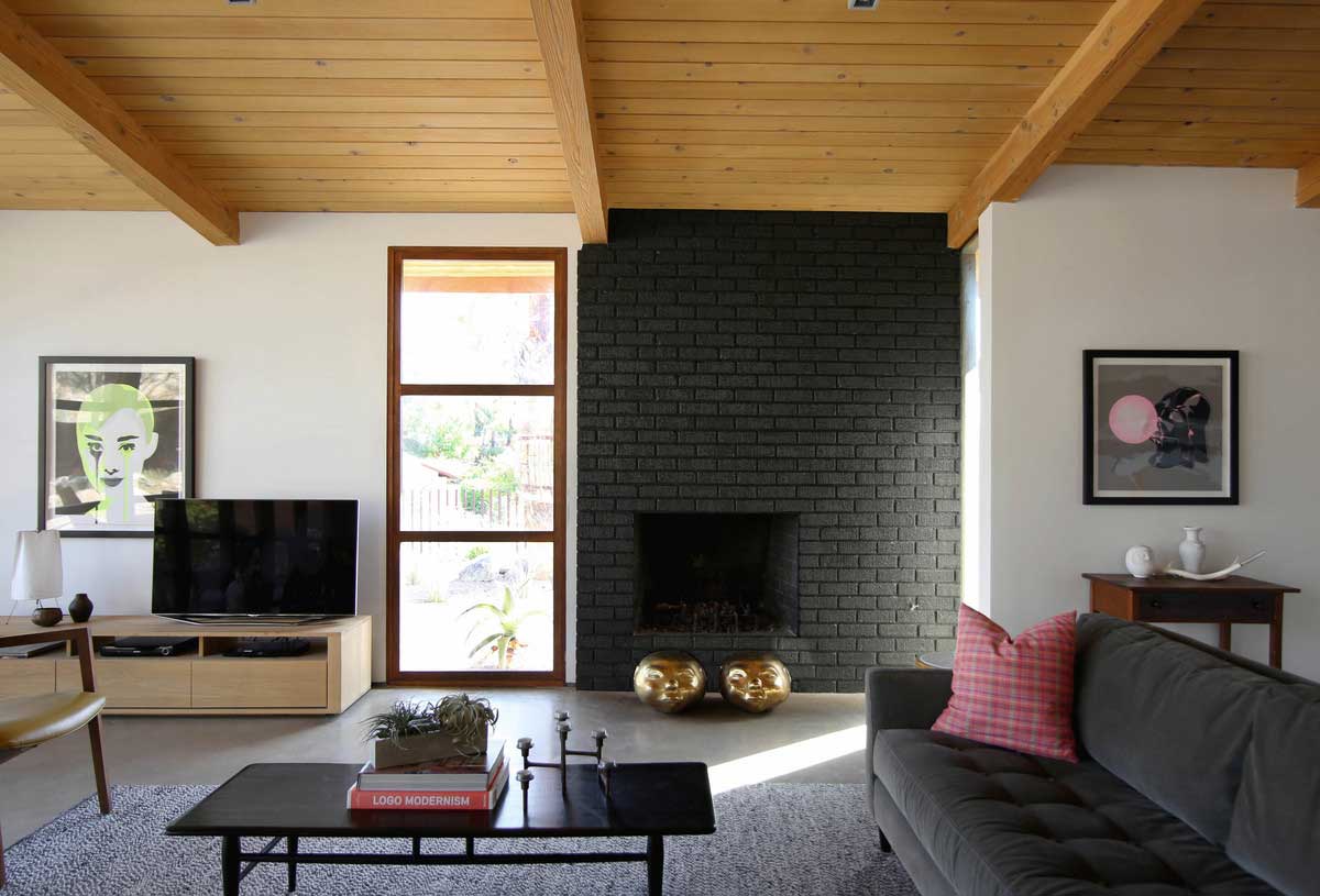 black brick fireplace design - Chino Canyon House