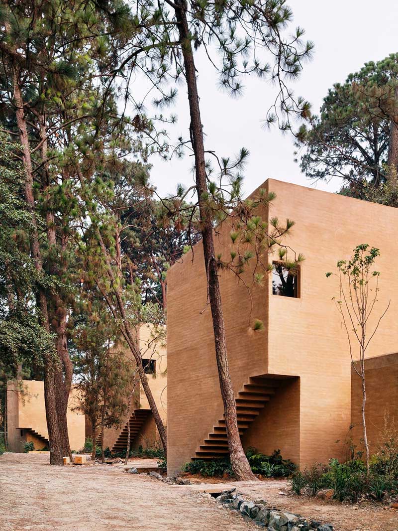 earth brick home design side - Entre Pinos