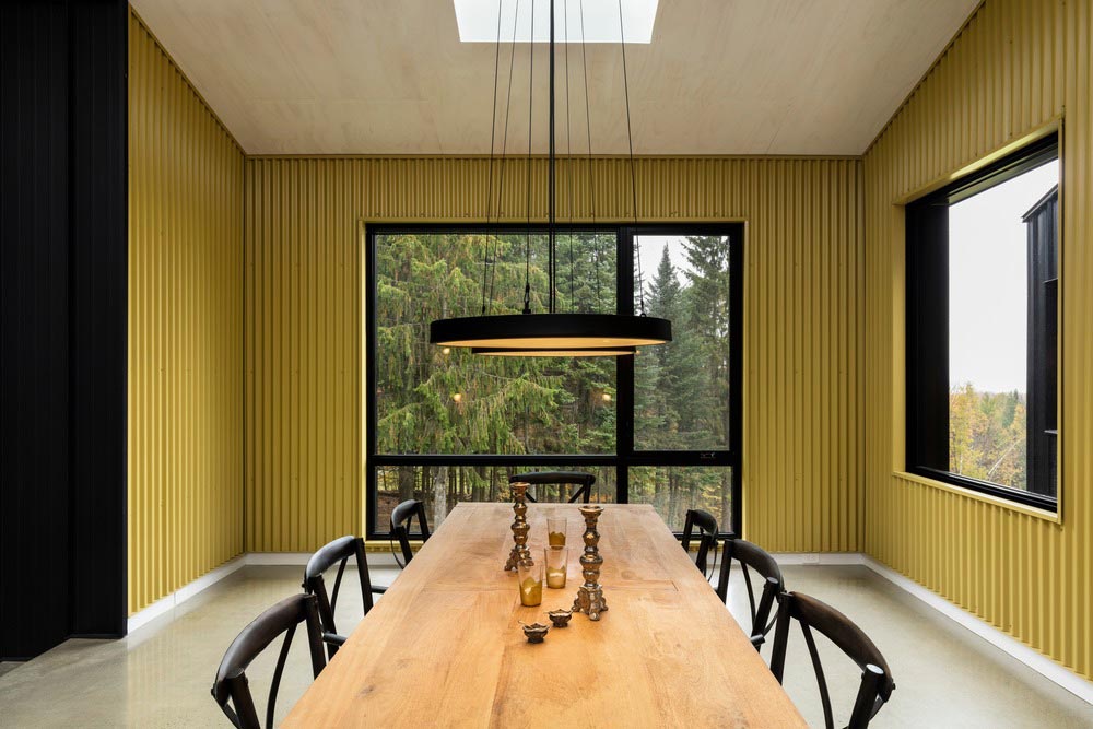 hillside home dining design tux - Abercorn Chalet