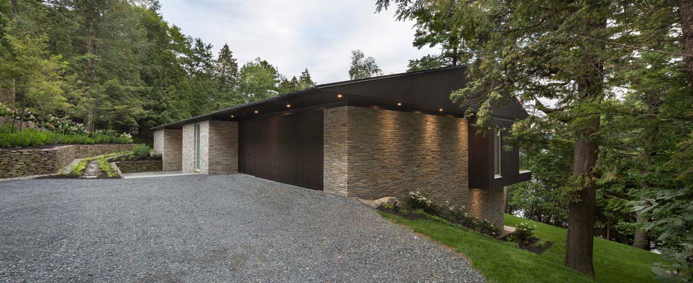 hillside lake house facade - The Slender House