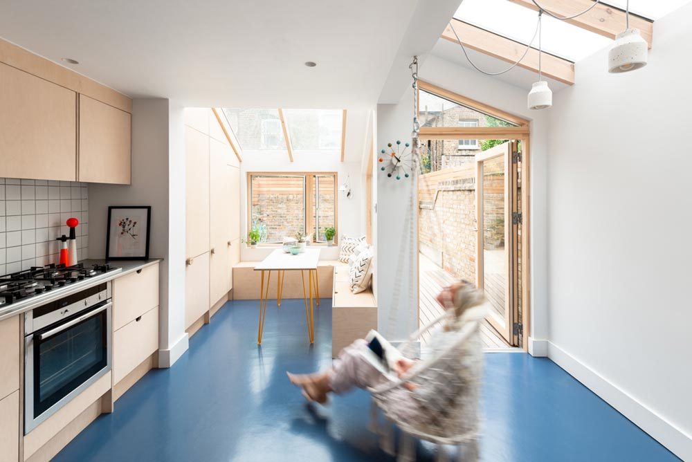 Simplistic Design Meets Sea Blue Rubber Floors In This Home Extension