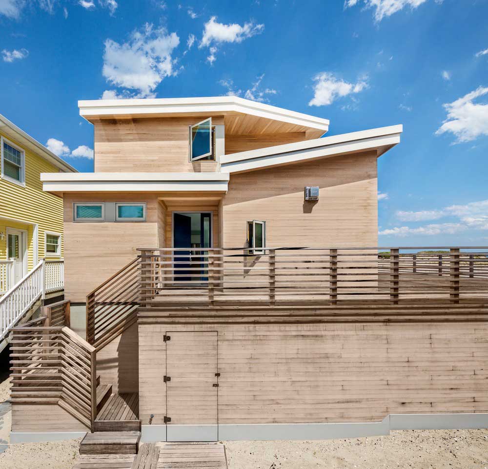 modern beach house front - Surfboard House