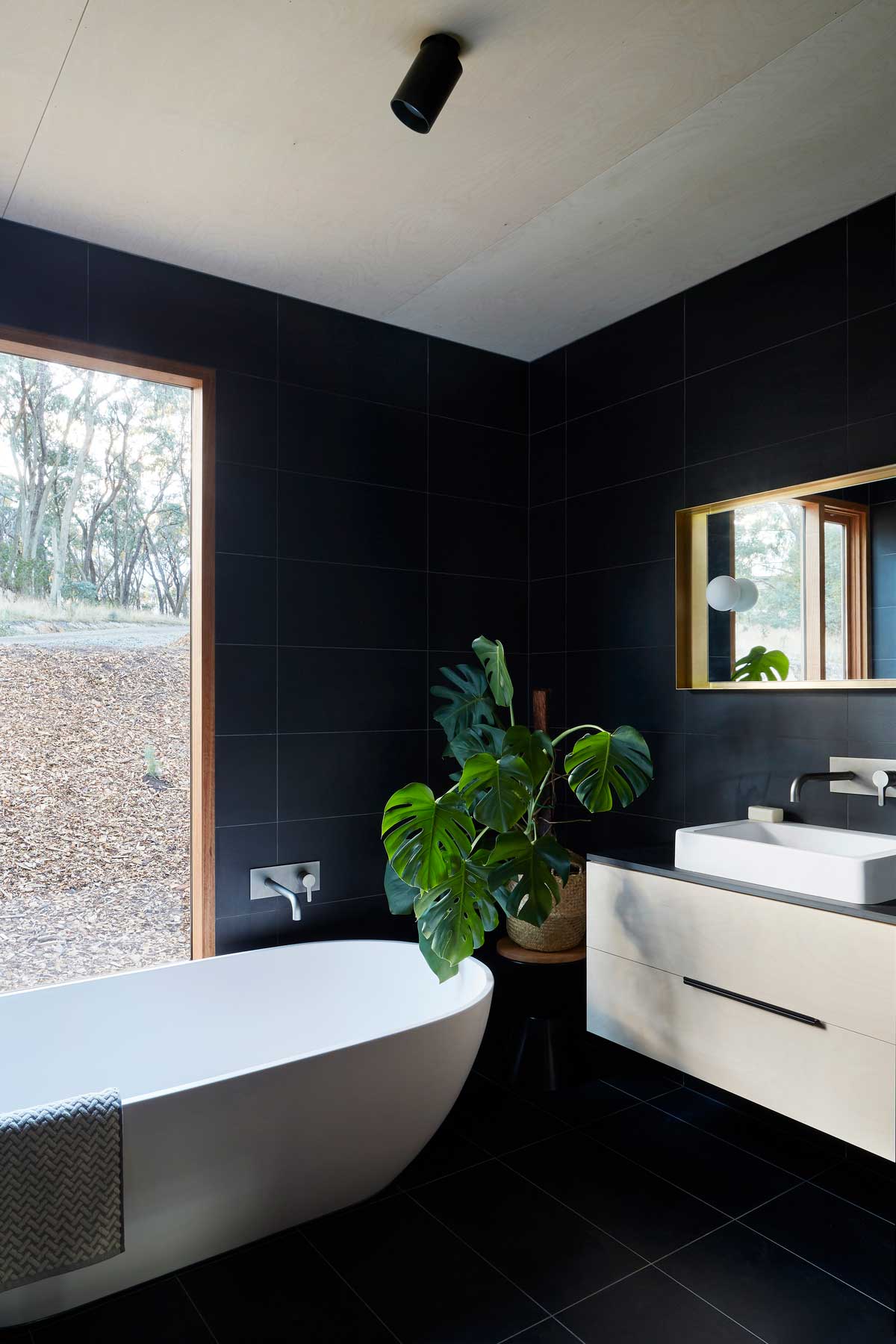 modern black bathroom design - Two Halves House