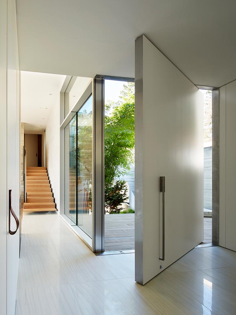 modern coastal home entrance design mb - Sunset House