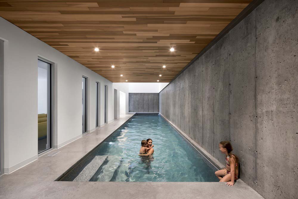 modern family lake house indoor pool - L'Accostée House