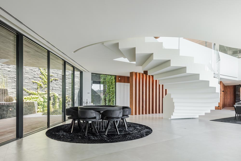 modern hillside home staircase design ta - Fraiao House