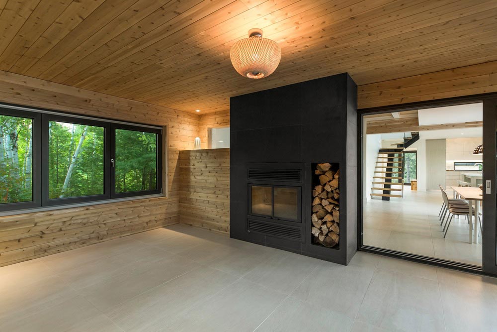 Modern lake cottage fireplace design