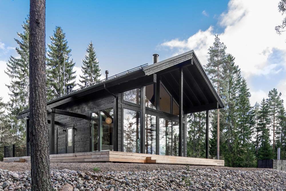 Beautiful Log Cabin Design In Finland With Floor To Ceiling