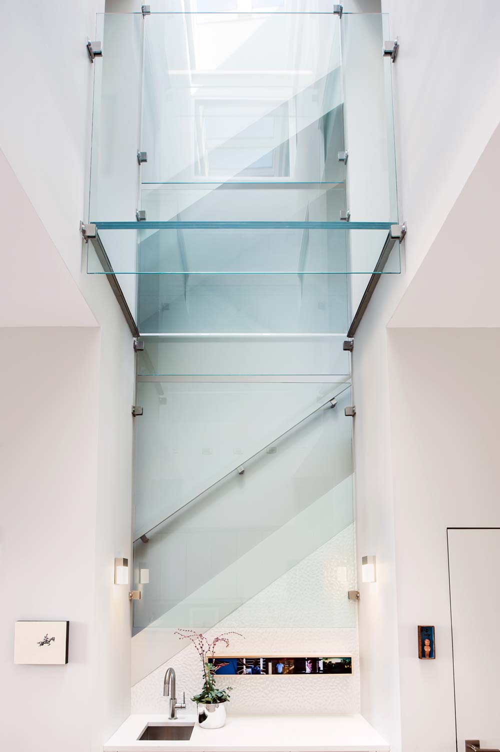 modern row house skylight glass floor