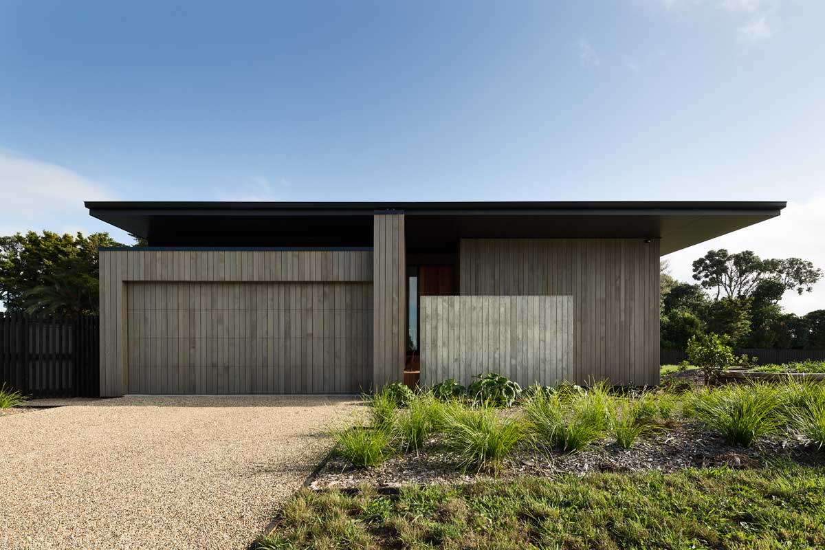 modern split level home facade - House Under Eaves