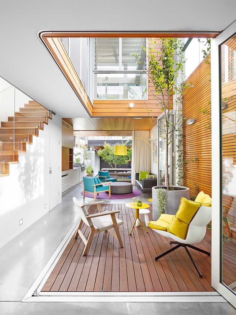 Narrow Lot Family House Designed with Inner Courtyard in Narrow Lot Family House Designed with Inner Courtyard in