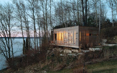 prefab-cabin-lake-sunset