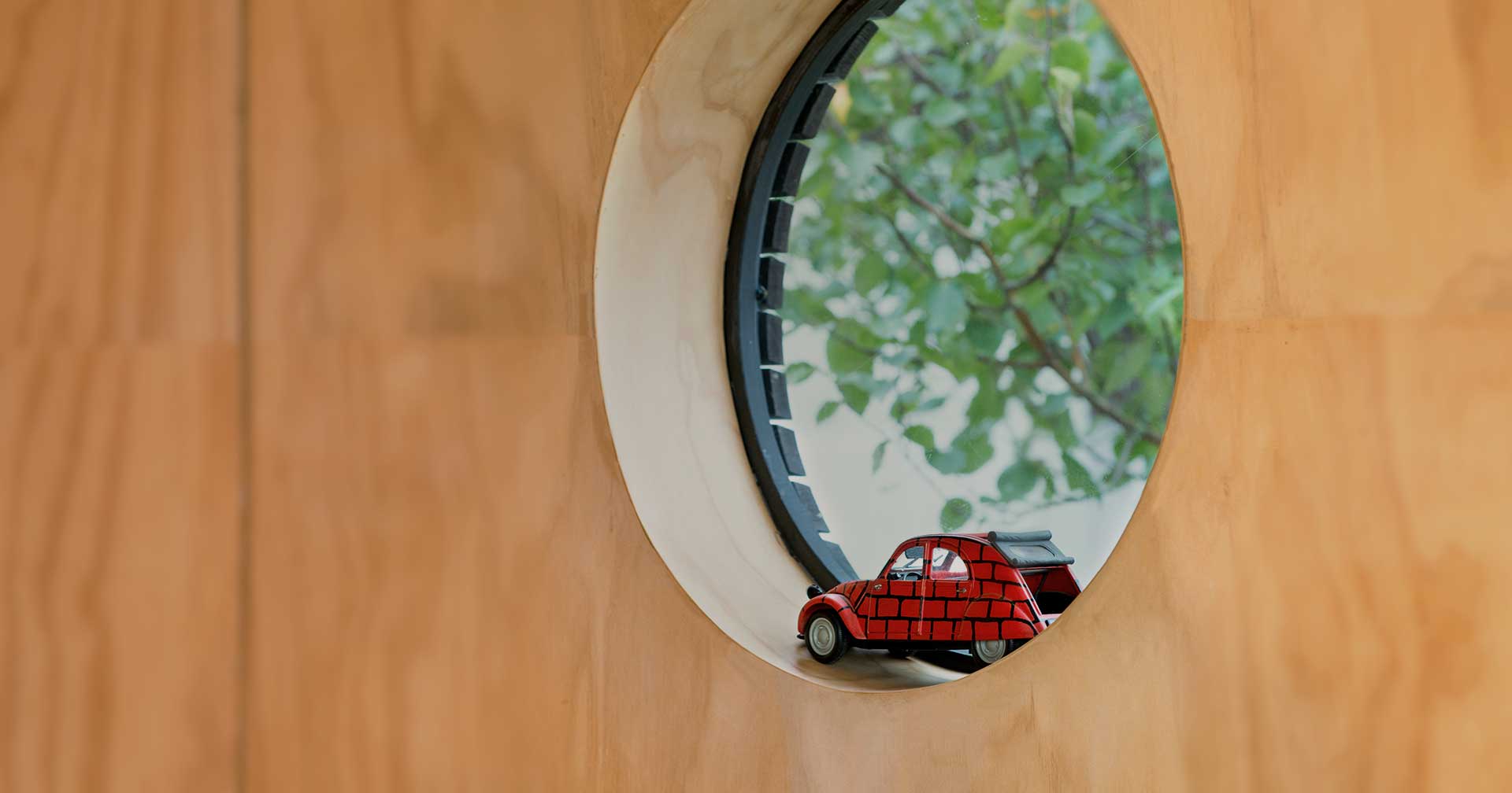 Small prefab cabin round window