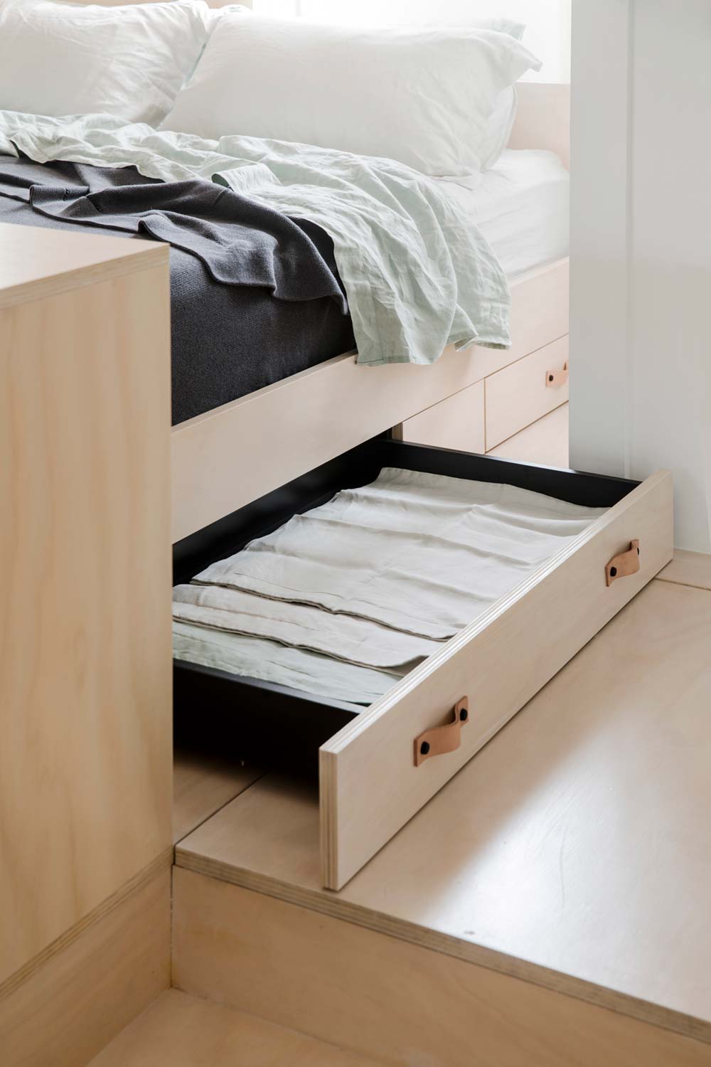 Tiny apartment under bed storage drawer