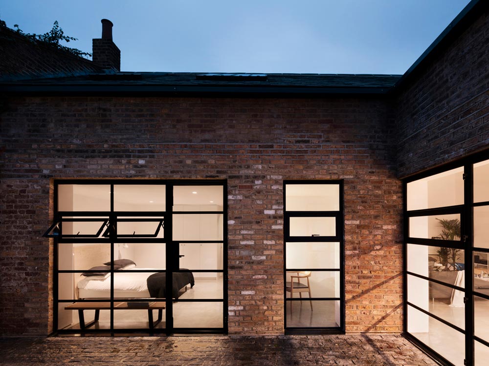 warehouse home courtyard design - Defoe Road Warehouse Conversion