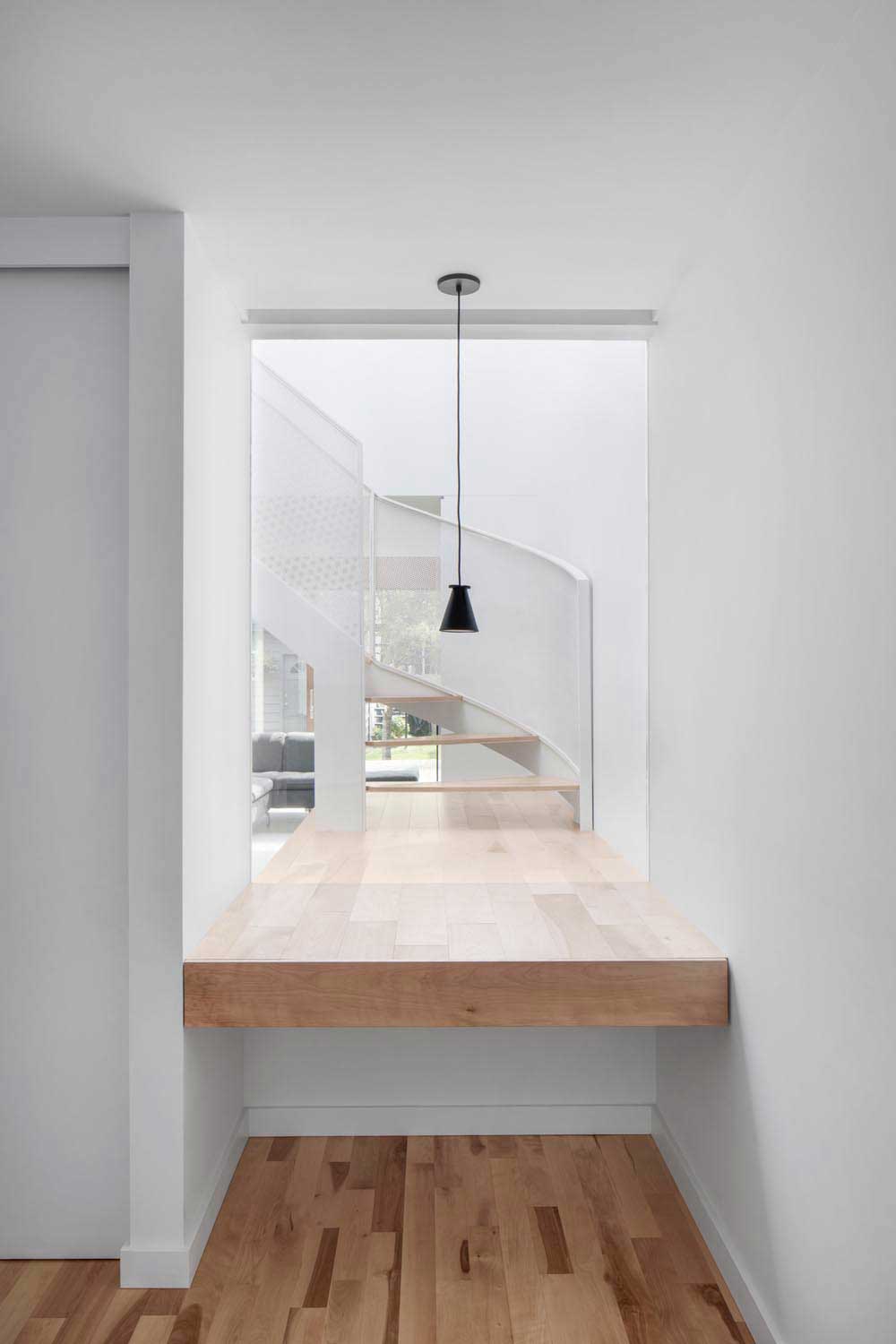 wooden stairs work desk - De la Roche Residence